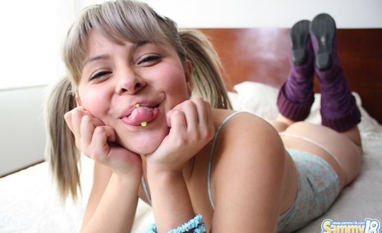 Sammy 18 - Sammy bored on the bed and having sexy shots